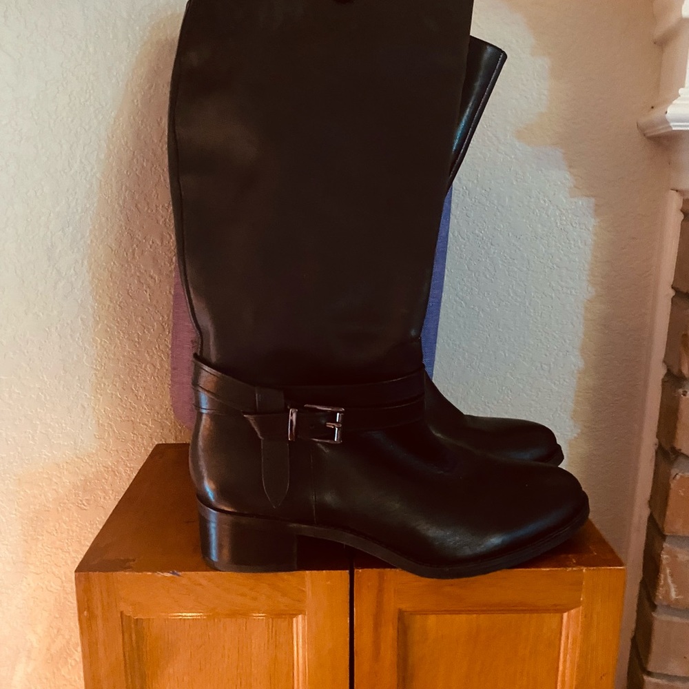 Alex Marie tall black boots with ankle strap.